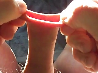 Man with a fetish plays foreskin games